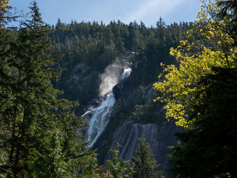 Clouds of mist around the Shannon falls in springtime - Squamish, BC, Canada