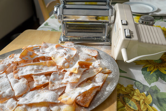 Homemade chiacchiere with icing sugar &ndash; Italian carnival pastry (Frappe, Crostoli, Angel Wings, Bugie)