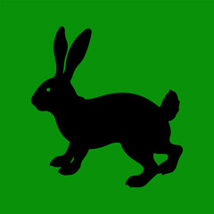 Obraz premium A dynamic vector Silhouette illustration of a hare hopping or running green background