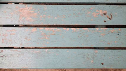 Weathered blue wooden planks with rustic peeling texture