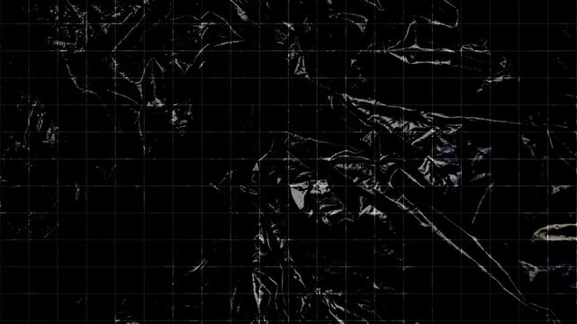 glossy black vintage trash bag plastic texture surface with moving up square grid loop in stop motion background animation
