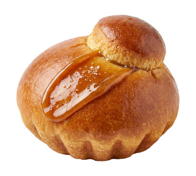 Brioche top flips slightly and lands back, smearing glaze into a dramatic streak
