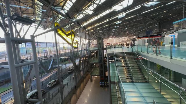 Interior architecture of modern international airport in Cologne Bonn in Germany, cinematic shot