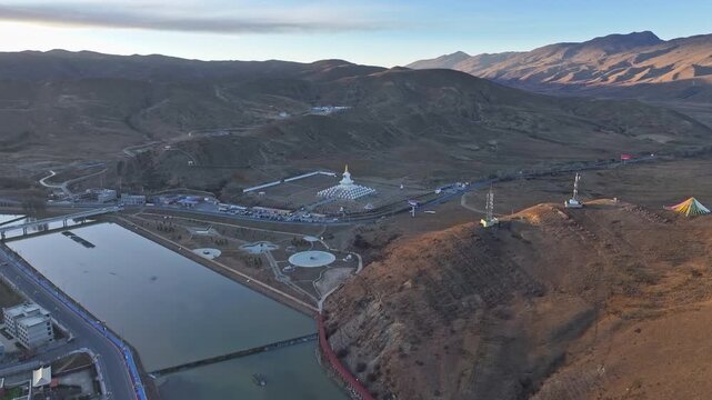 The White Pagoda of Daocheng County at dusk