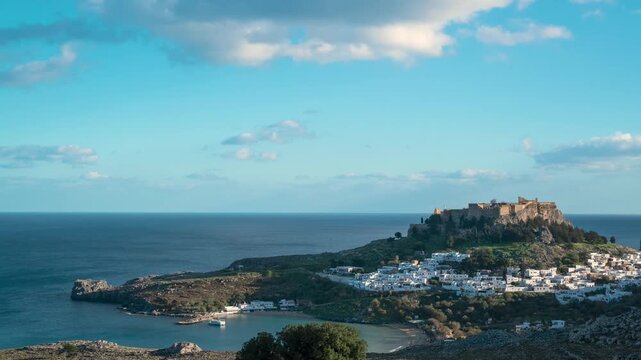 Day to Night Timelapse Zooming Out and Up Over Lindos Acropolis in Rhodes, Greece