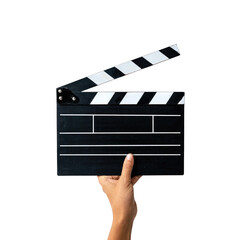 Hand holding a black and white movie clapperboard against a black background