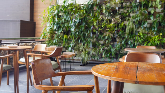 empty outdoor cafe tables