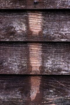 Weathered Wooden Wall with Sun-Faded Vertical Pattern