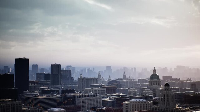 dawn city skyline with soft haze, rooftop panorama shows dense urban blocks, domed landmark and highrise silhouettes under pastel sky, quiet streets and subtle
