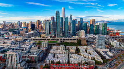 Downtown San Francisco skyline aerial view. Aerial panorama of downtown San Francisco with modern skyscrapers and coastal bay.