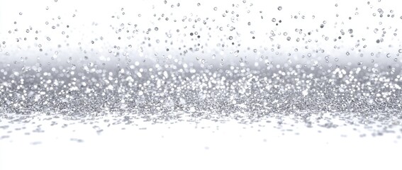 Obraz premium Glittering silver particles cascade down, forming a sparkling, textured ground. White background