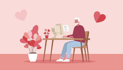 Senior man using a computer surrounded by heart plants symbolizing online dating or romantic communication