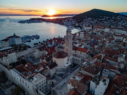 Split Croatia Cathedral of Saint Domnius bell tower and historic city harbor aerial drone view.
