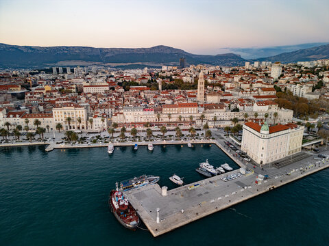 Split Croatia Cathedral of Saint Domnius bell tower and historic city harbor aerial drone view.
