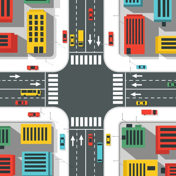 Aerial view of a busy city intersection with colorful buildings and traffic