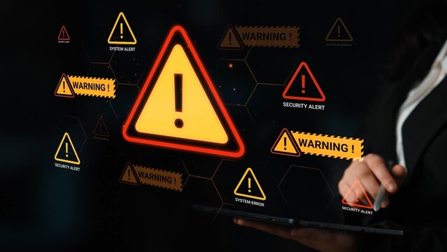 Bright warning and alert symbols illuminated on modern device screen highlighting system alerts and security issues in technology and cybersecurity context Gluon.