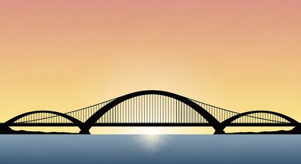 Silhouette of a large bridge at sunset.