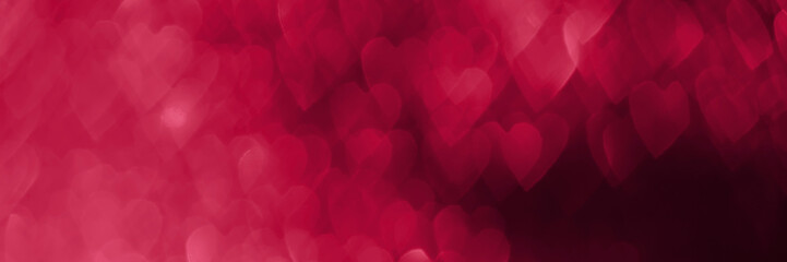 Magenta, pink hearts banner, sparkling glitter bokeh background header, valentines day abstract defocused texture.
