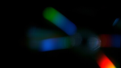 Fototapeta premium Real Lens Flare Reflections for Overlay or Transition Isolated on Black