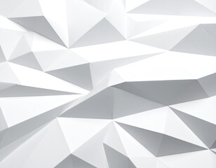 Obraz premium Abstract close-up of a textured white surface composed of sharp, geometric facets and subtle shadowing.