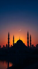 Fototapeta premium Silhouette of mosque at sunset with minarets.