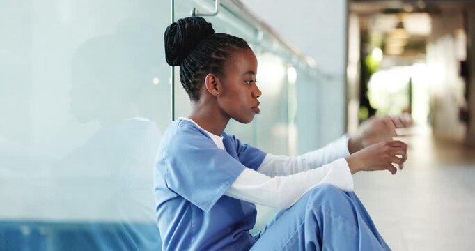Medical, grief or black woman in hospital with thinking, patient loss or bad news in surgery result. Healthcare, reflection or nurse in clinic with guilt, operation mistake or worry in emergency case