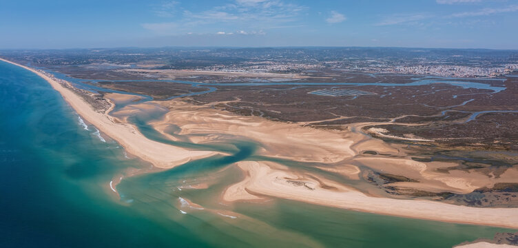 This aerial view captures Ria Formosa and Praia de Faro in Portugal
