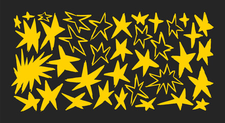 Obraz premium Star hand crayon collage in a dynamic sticker look featuring a large collection of yellow hand drawn stars in varied sizes and expressive shapes on a dark background. Raw sketch textures sharp