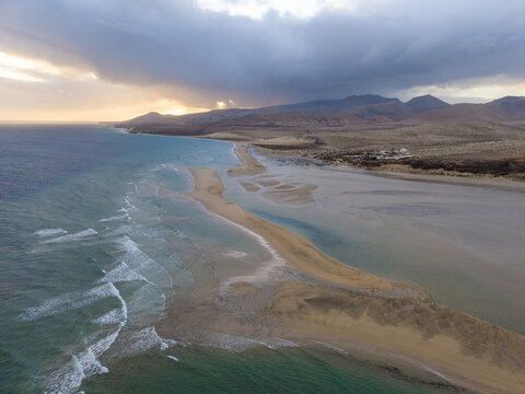 Aerial view of the golden sands of the Peninsula and the lagoon in Jandia, with turquoise waters at sunset, Jand&Atilde;&shy;a Natural Park, Fuerteventura, Canary Islands, Spain.