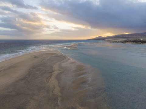 Aerial view of the golden sands of the Peninsula and the lagoon in Jandia, with turquoise waters at sunset, Jand&Atilde;&shy;a Natural Park, Fuerteventura, Canary Islands, Spain.