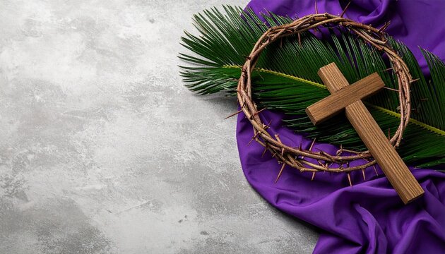 Fastenzeit &ndash; Kreuz und Dornenkranz mit Palmzweig auf violettem Tuch als Symbol f&uuml;r Palmsonntag und Passionszeit