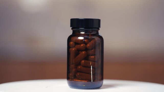 Drug pills spinning in a bottle