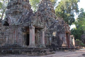 Naklejka premium ancient ruined hindu and buddhist khmer temple (preah khan) in angkor in siem reap in cambodia