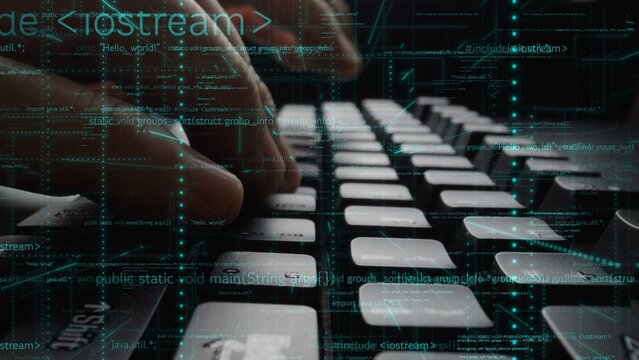 Close-up view of hands actively typing on a keyboard, surrounded by digital code, symbolizing software development and technology in a modern workspace. Xenic