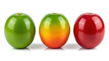 Three colorful coffee beans in green, ripening, and red stages on white background