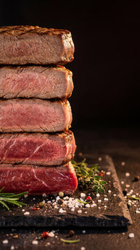 Five steaks stack displays doneness degrees chart guide, Blue, Rare, Medium Rare, Medium, Medium well. Social media post, copy space, dark background