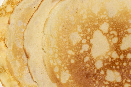Delicious stack of golden brown pancakes breakfast food texture background
