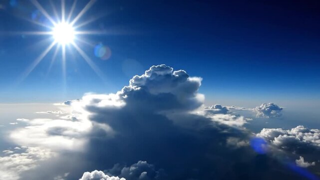 Stunning sunny sky with puffy white clouds and bright sunbeam