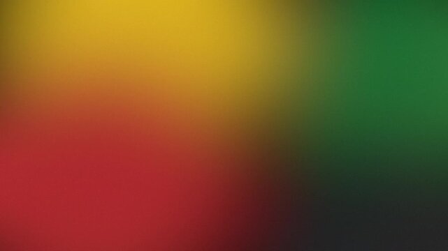 Gradient with red, gold, and green blur across a dark backdrop. Black history month colors background
