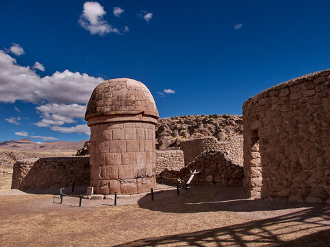 Maukallaqta archaeological complex which feature distinctive domed stone structures and cylindrical towers. Located in the Coporaque district of Espinar, this site is renowned for its well-preserved 
