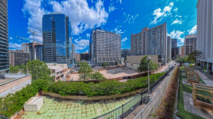 Fototapeta premium Modern urban residential district with landscaped public spaces and contemporary city architecture
