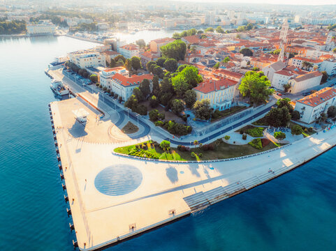 Zadar historic peninsula roman architecture city. Dalmatia region of Croatia coast beach. The Greeting to the Sun monument, Zadar skyline and sea organ.