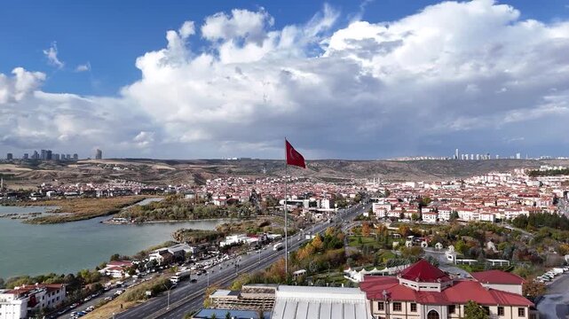 Wide-angle aerial view of the Turkish flag with the entire lake horizon