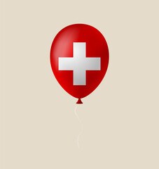 Obraz premium Glossy Red Switzerland Flag Balloon Floating Cheerfully, Representing National Identity, Travel, Patriotism, and Festive Celebrations.
