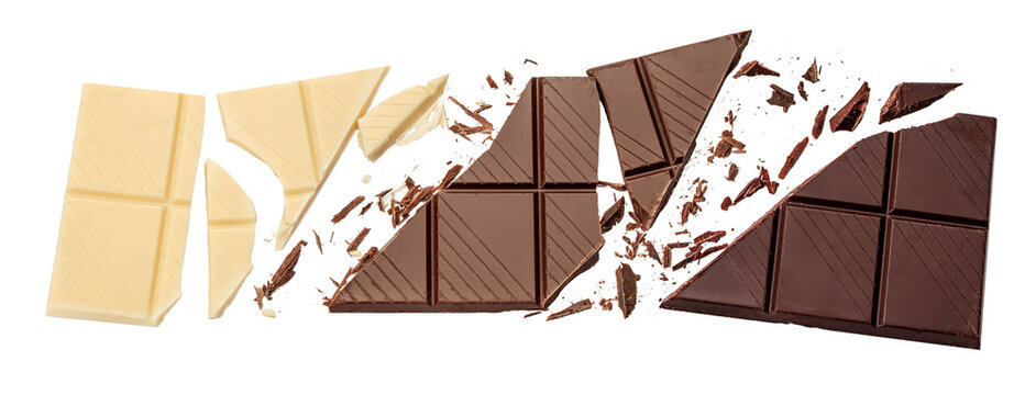 Broken white and dark chocolate bars with shards and pieces isolated on white background, flat lay composition with copy space.