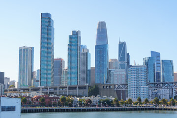 View of San Francisco from a tour boat in the middle of the bay, capturing the city skyline, waterfront, and iconic landmarks. Scenic perspective from the water, ideal for travel, tourism, and maritim