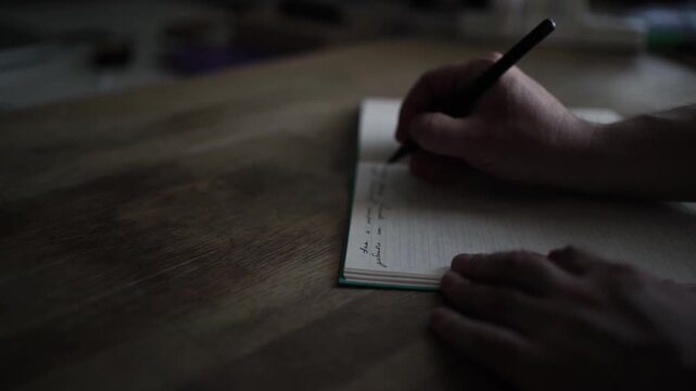 Writing in Journal Closeup with Pen on Paper