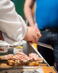 Professional chef shaving fresh truffle over a gourmet dish, capturing luxury, culinary mastery, and exquisite flavor