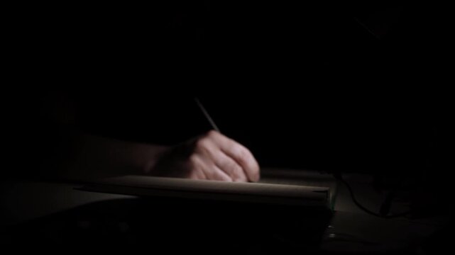 Journaling Thoughts in Notebook for Self-Reflection During Depression