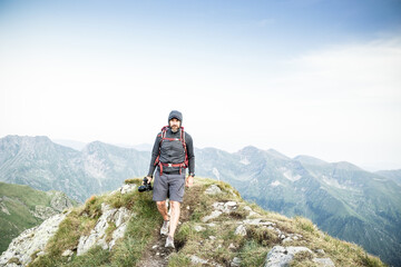 Fototapeta premium trekking with a dog in hogh mountains
